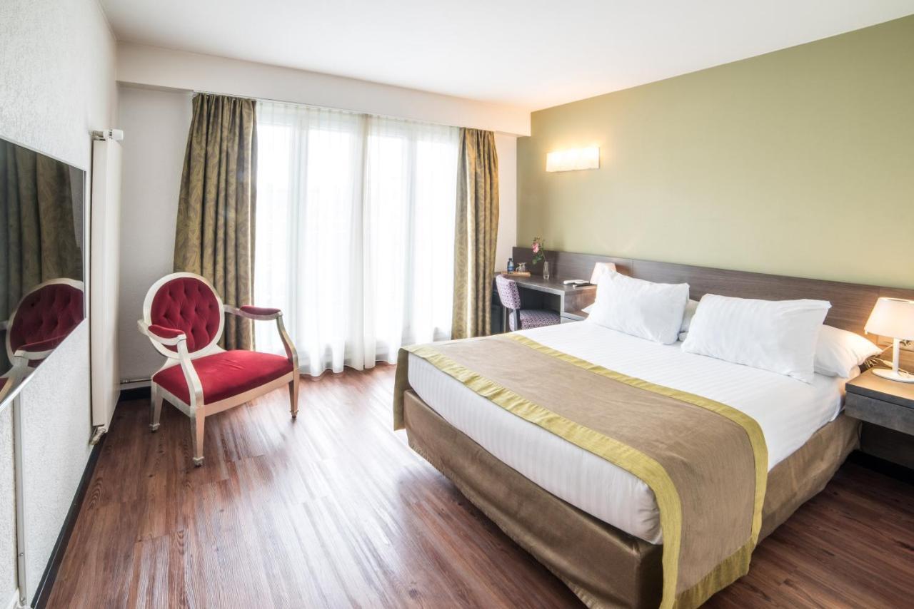 Hotel Montana Genebra Quarto foto