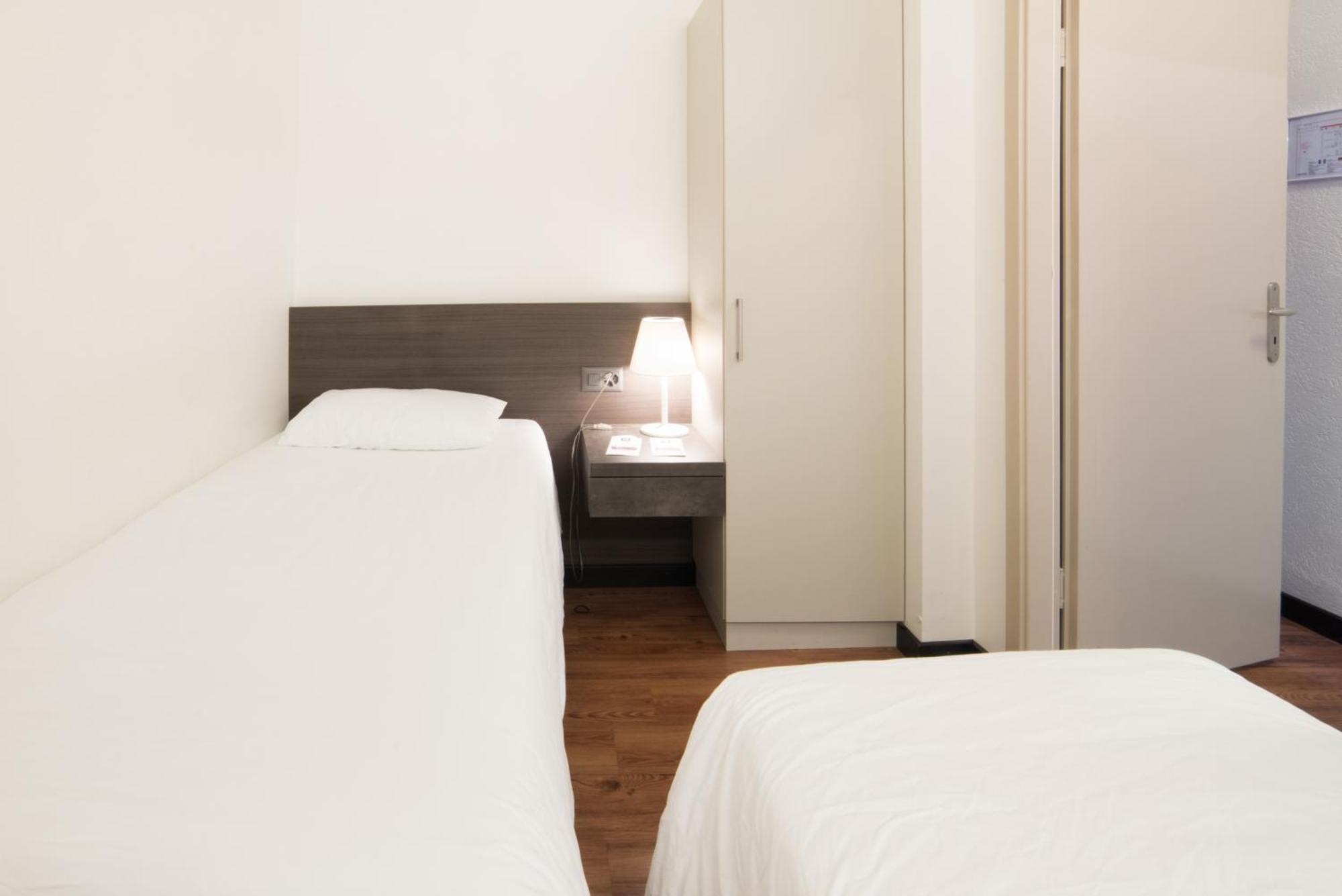 Hotel Montana Genebra Quarto foto