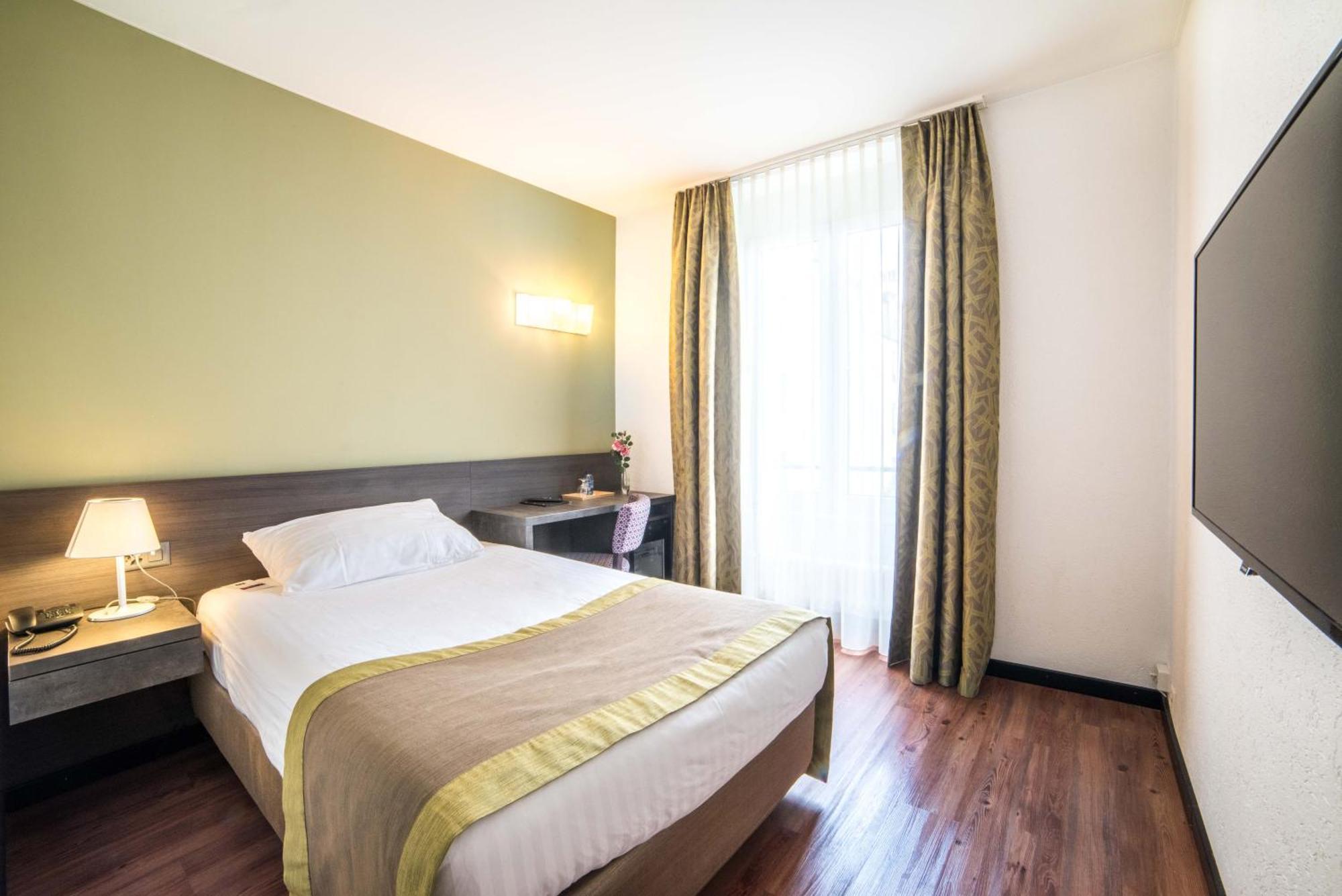 Hotel Montana Genebra Quarto foto