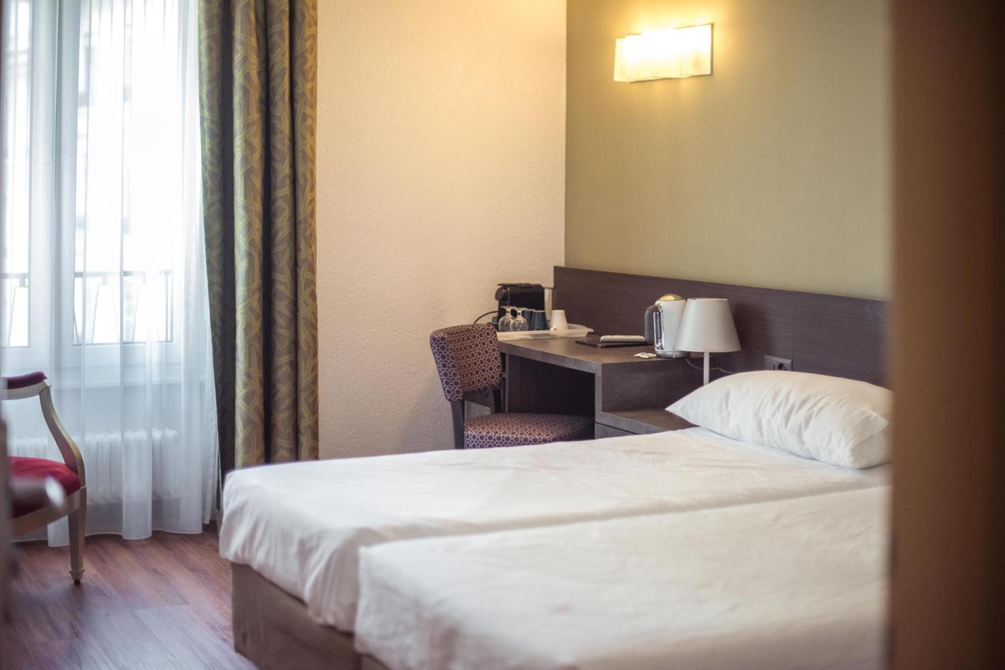 Hotel Montana Genebra Quarto foto